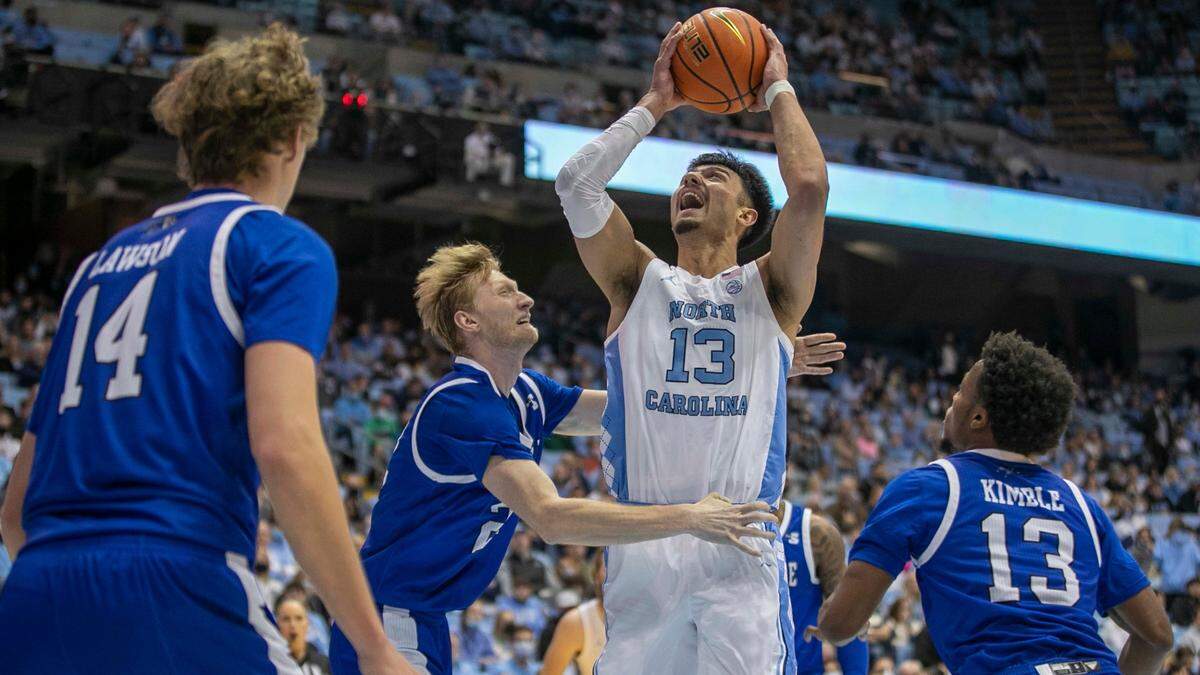 A transfer from Marquette, North Carolina sophomore Dawson Garcia (13) is averaging 12.2 ppg and 6.1 rpg in his first season with the Tar Heels.