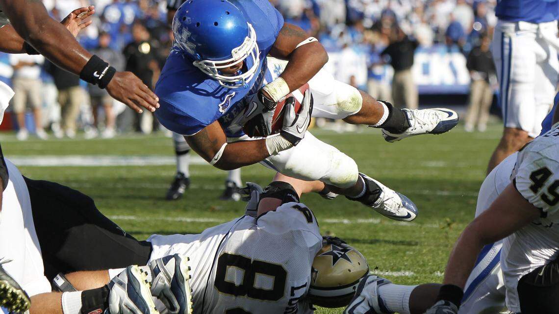 Kentucky's Derrick Locke jumped over the line for a third-quarter touchdown, his first of two on Saturday.