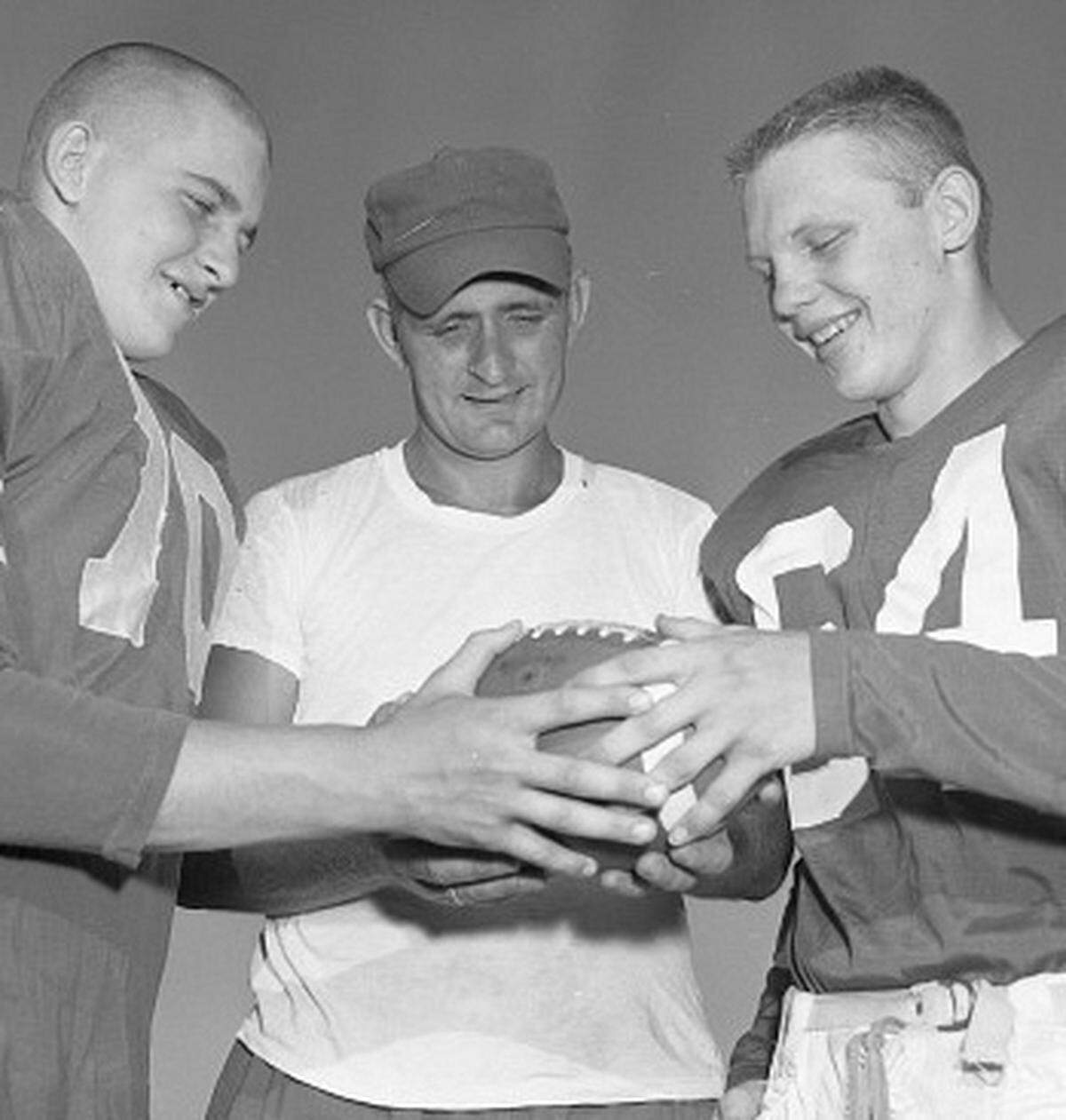 Then new Lafayette coach Roy Walton with players Fritz Bodenheimer, left, and Dickie Hulette before the 1958 season opener.
