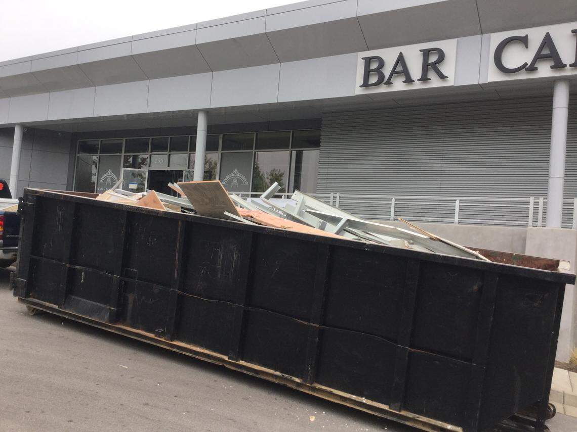 A Dumpster in front of the Shakespeare & Co. was filled with debris last week from the demolition after the restaurant at Hamburg closed.