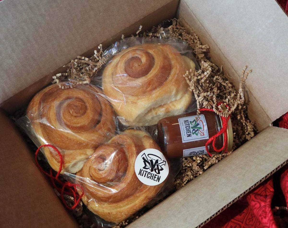 DV8 Kitchen has five bakery boxes to choose from: Cinnamon rolls, croissants, chocolate chip cookies, sourdough bread or housemade jams. DV8 Kitchen can either ship them for you or you can pick up a beautifully wrapped gift box.