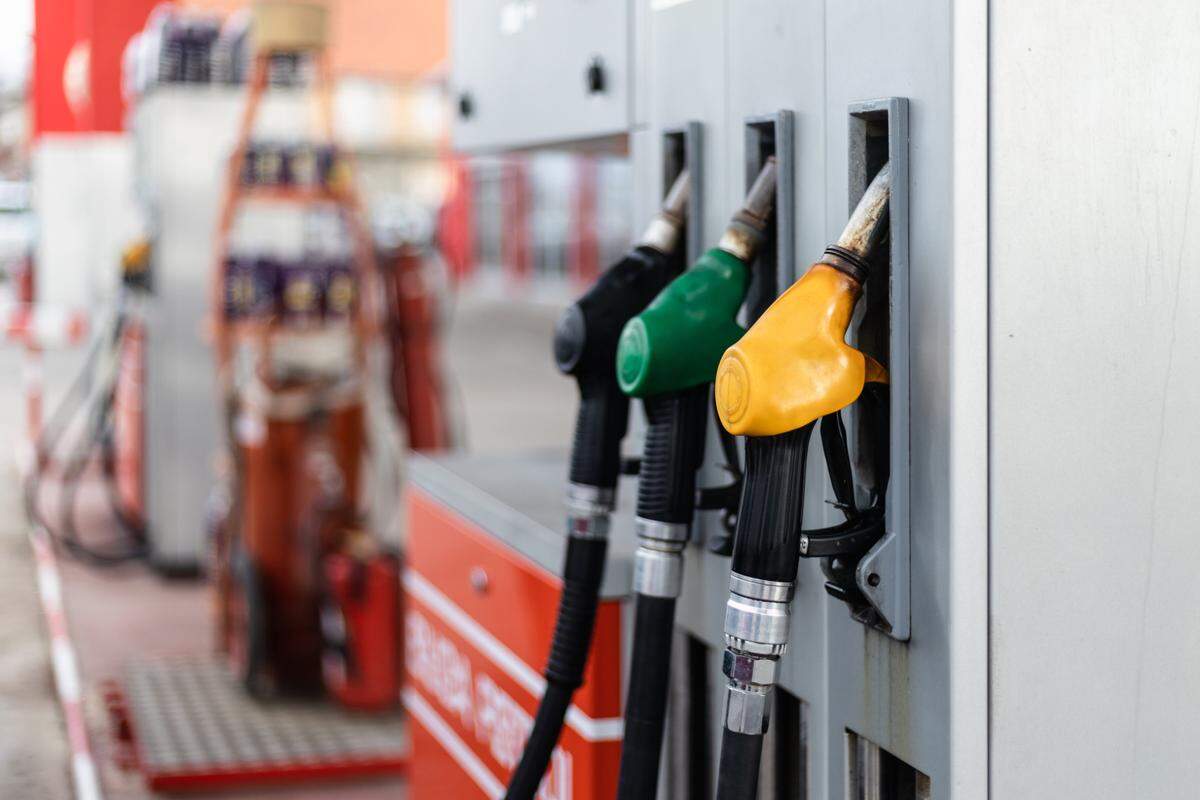 A stock image shows a close-up of a fuel pump.