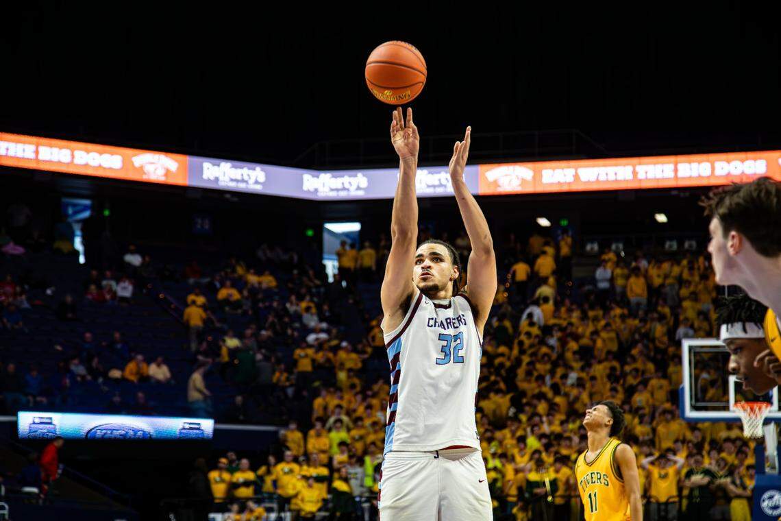 St. Xavier’s Chance Dillingham (11) cringes as Jeffersontown’s Camron McDaniels (32) makes both of his free throws with three seconds left to close out the Chargers’ upset win Wednesday.