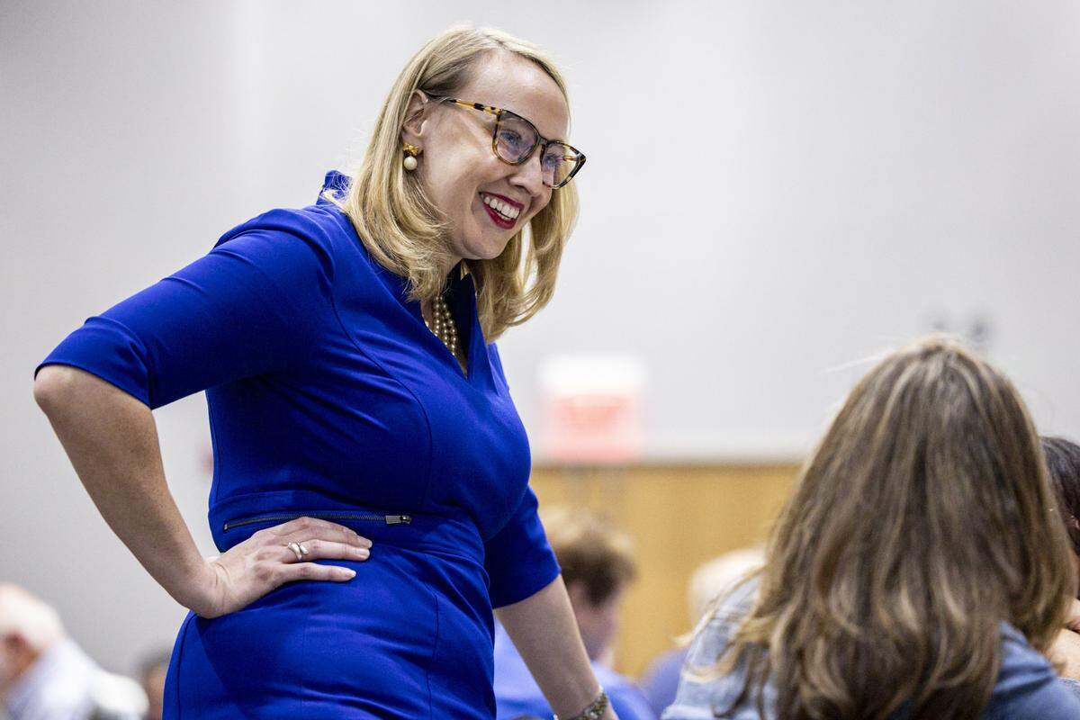 Erin Petrey, a candidate for the 6th district, speaks with attendees during the annual Wendell H. Ford Dinner on Tuesday, Sept. 30, 2025, at Clay Community Center in M ount Sterling, Ky.