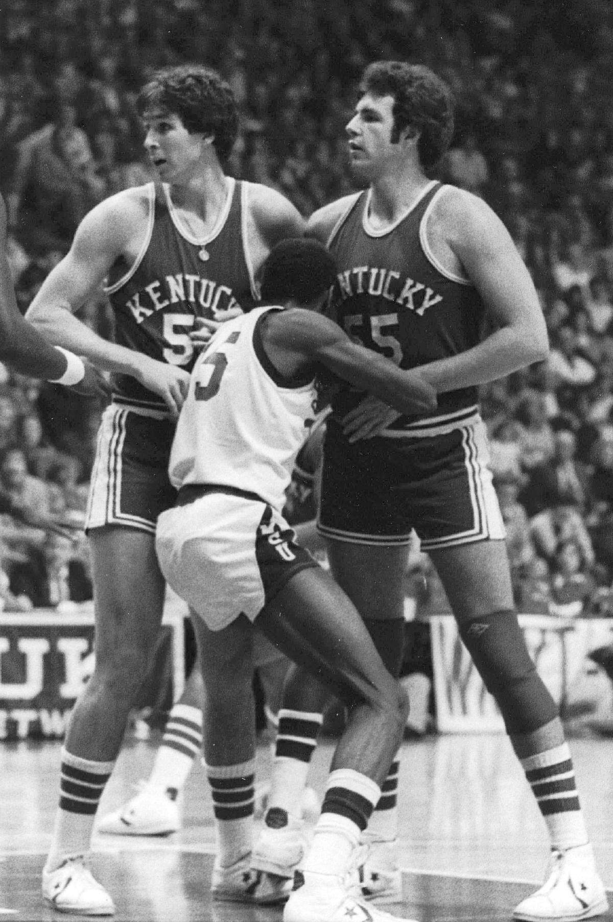 Kentucky’s Rick Robey, left, was chastised by North Carolina Coach Dean Smith over perceived rough play during the 1977 NCAA Tournament East Region finals.