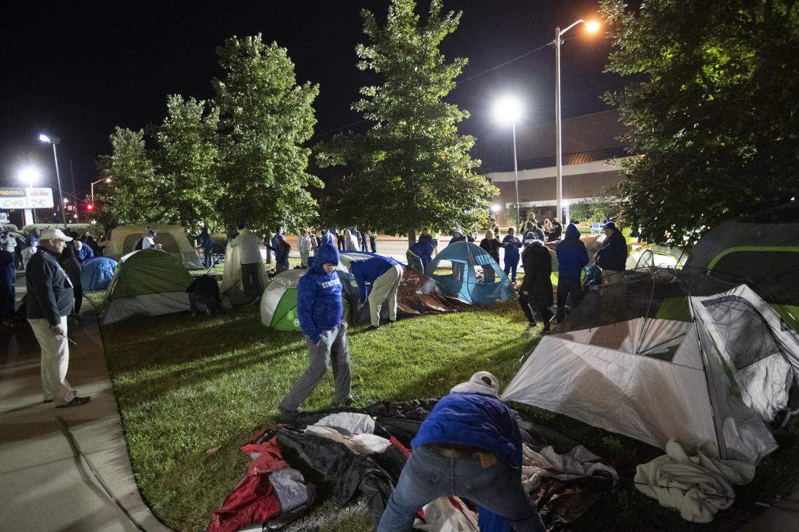 Fans rush to set up tents outside Memorial Coliseum for the Big Blue Madness campout in 2022.
