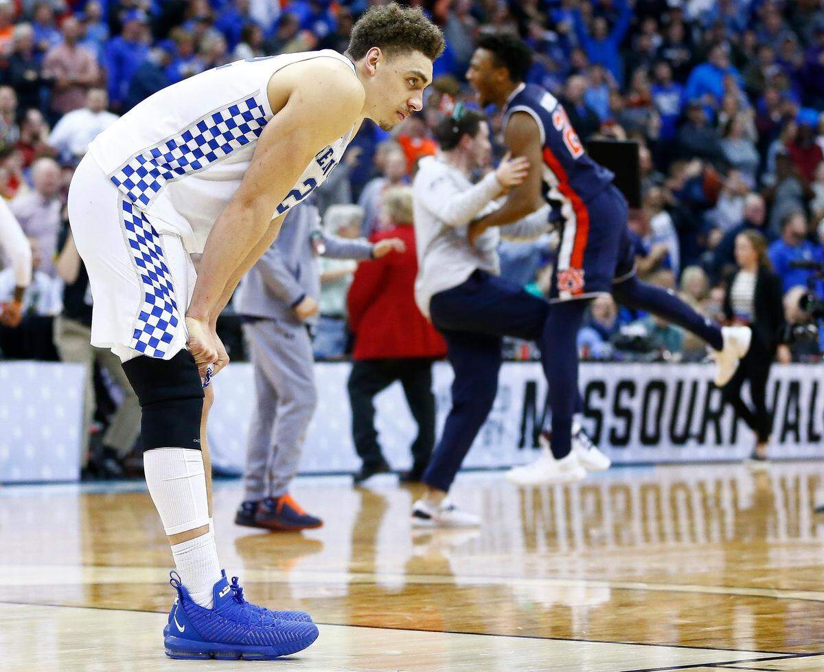 Reid Travis paused in thought as Auburn celebrated its Elite Eight victory over Kentucky.