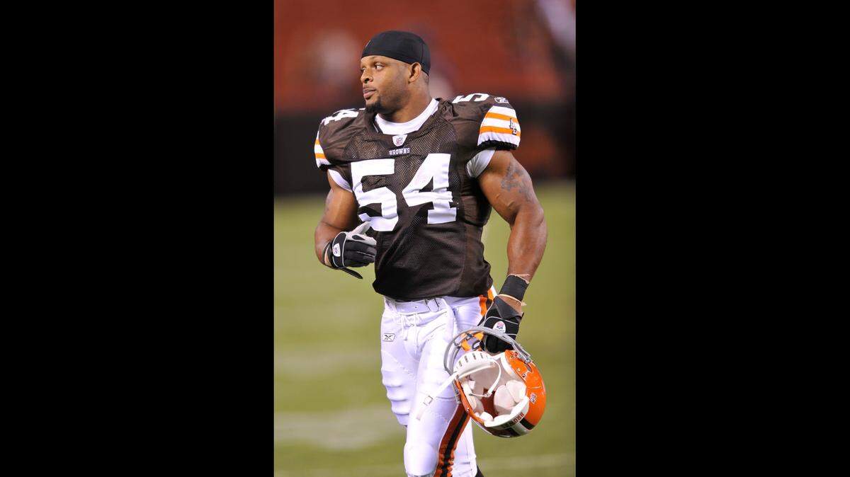 FILE - In this Aug. 29, 2009, file photo, Cleveland Browns’ Robert McCune heads off the field after a preseason NFL football game against the Tennessee Titans at Cleveland Browns Stadium in Cleveland. Former NFL players Clinton Portis, Tamarick Vanover and Robert McCune pleaded guilty for their roles in a nationwide healthcare fraud scheme, the U.S. Department of Justice announced Tuesday, Sept. 7, 2021. (AP Photo/David Richard, File)