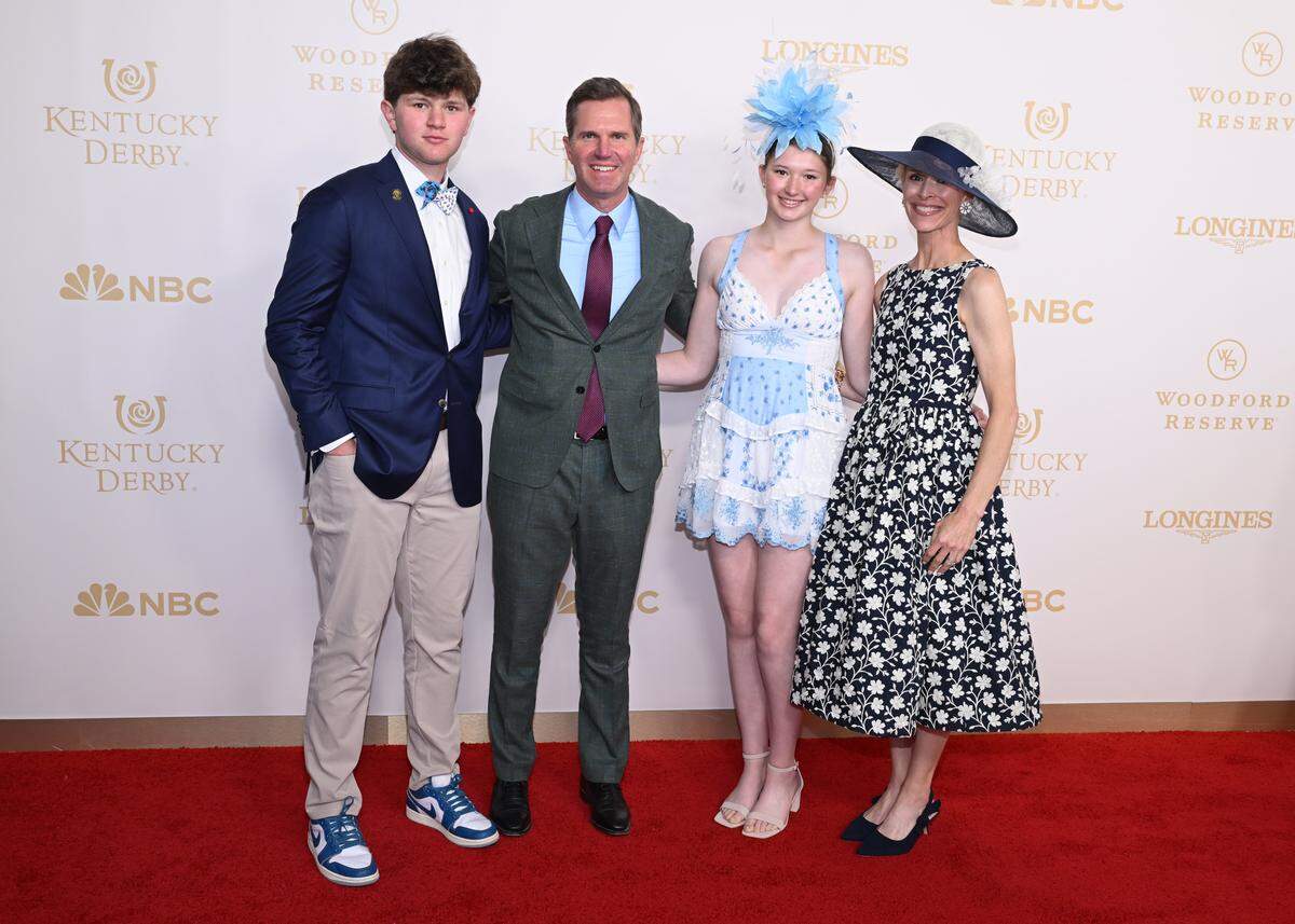 LOUISVILLE, KENTUCKY - MAY 02: Governor of Kentucky, Andy Beshear (2nd from L) and family attend the Kentucky Derby 152 at Churchill Downs on May 02, 2026 in Louisville, Kentucky. (Photo by Daniel Boczarski/Getty Images for Churchill Downs)