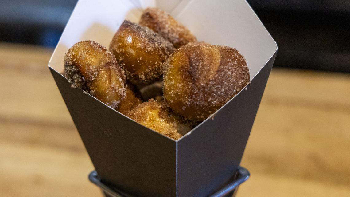 The Wandering Bock Pretzel Pub & Brat Haus does not offer pretzel bites except for its cinnamon sugar bites ($7). The popular treat is served with warm bourbon chocolate sauce.