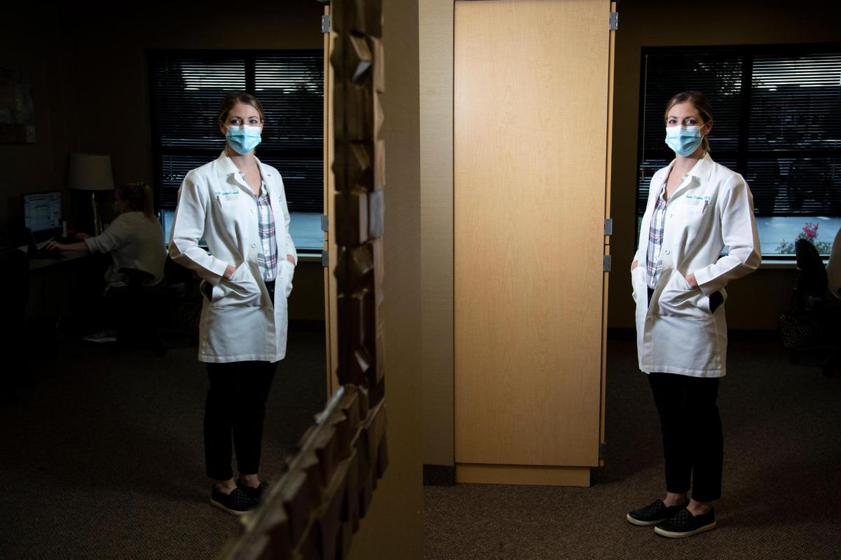 Dr. Sarah Borders, obstetrician and gynecologist, poses for a portrait at Lexington Women’s Health in Lexington, Ky., Tuesday, October 12, 2021. She both delivers babies from moms with covid and has daily conversations with pregnant patients in clinic about the importance of the vaccine.