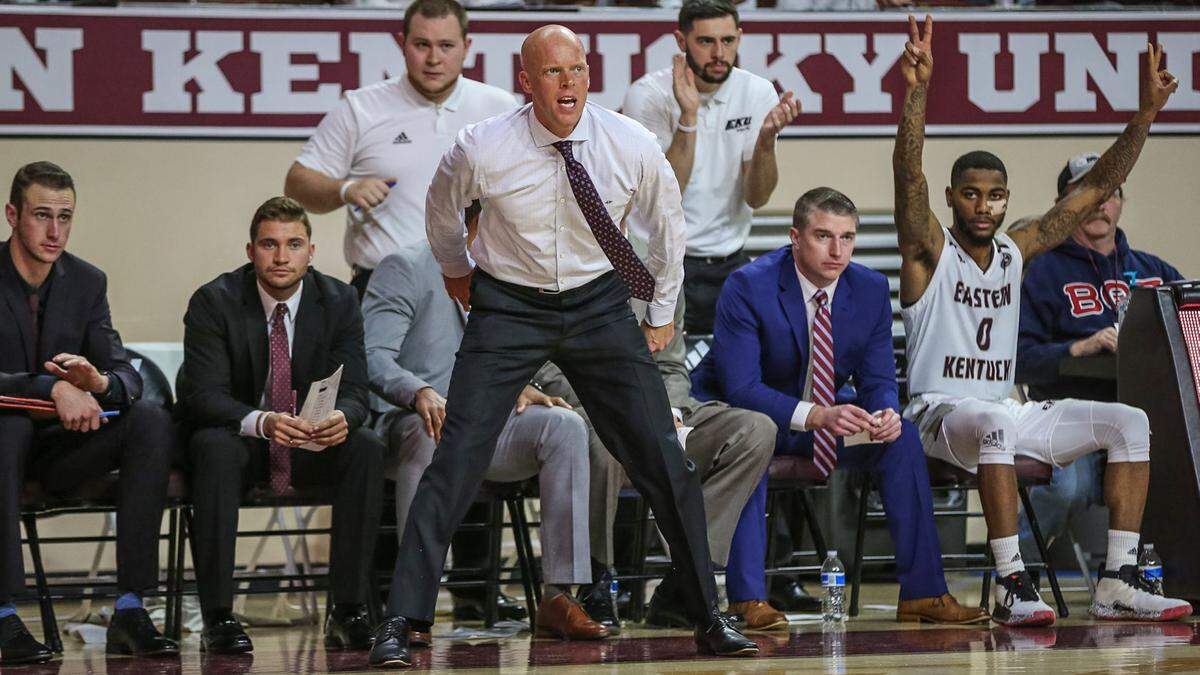 Eastern Kentucky Coach A.W. Hamilton (center) is trying to lead the Colonels (13-2, 7-1 OVC) to their first Ohio Valley Conference regular-season crown since 1978-79.