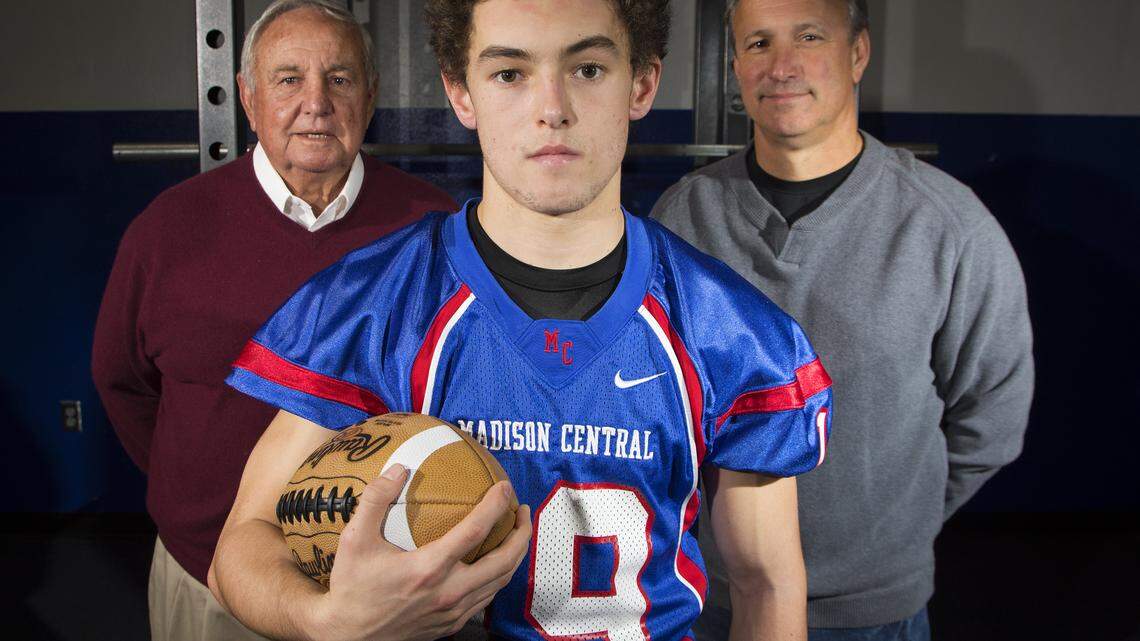 Kody Kidd with his father Keith, and grandfather Roy Kidd at Madison Central High School in Richmond.
Photo by Tim Webb  