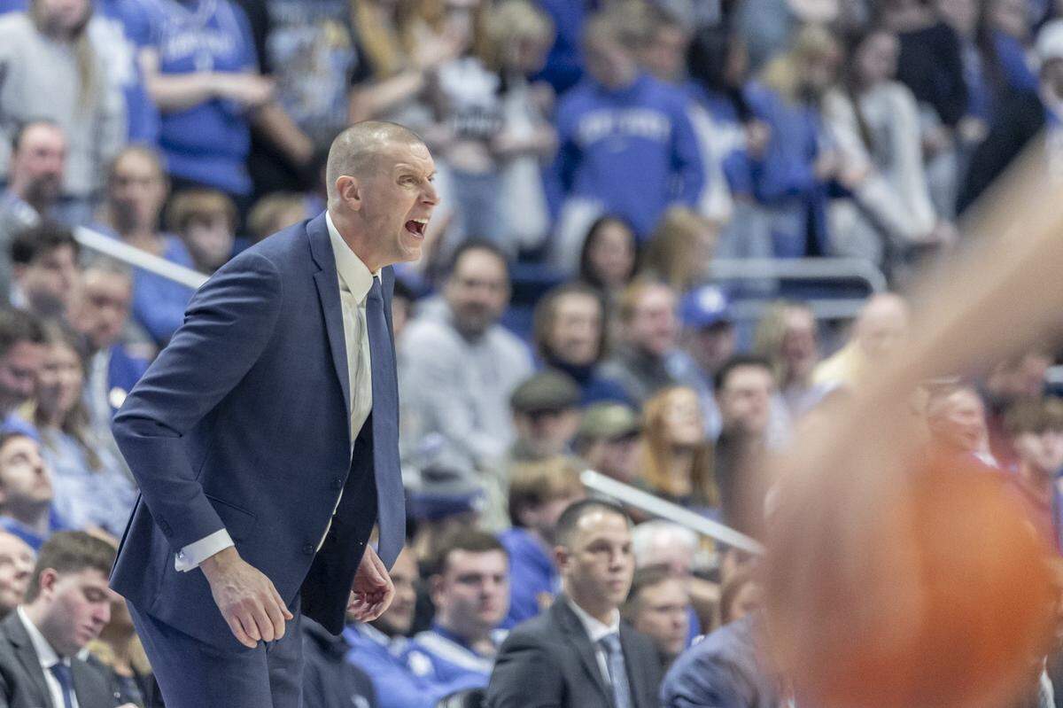 Kentucky head coach Mark Pope talks to his players during Tuesday’s game against LSU at Rupp Arena.