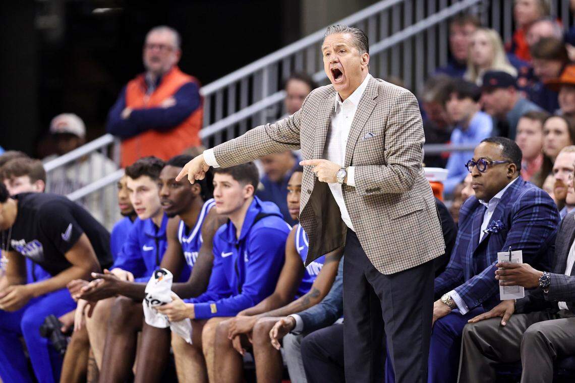 Kentucky head coach John Calipari calls to his players during Saturday’s game at Auburn. UK defeated Auburn, 70-59.