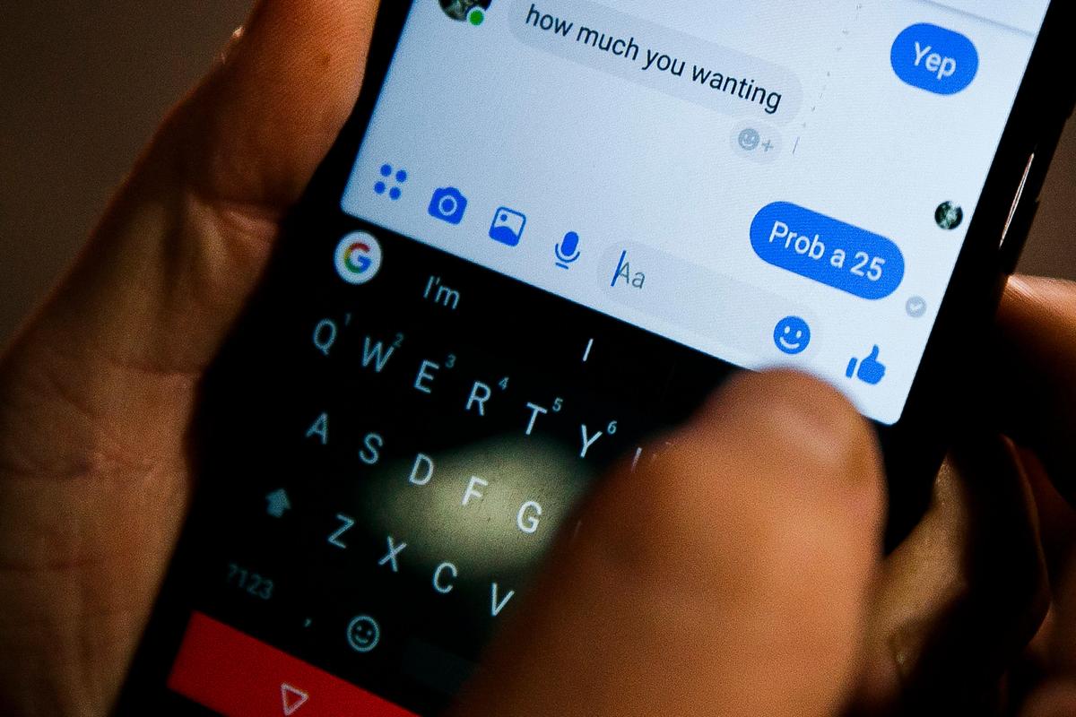 Dwayne Kilburn of Pikeville uses Facebook Messenger in the parking lot of Food City on Aug. 8 to communicate with a person selling meth. Kilburn has seen a rise in meth use across his community. “You can find it anywhere, buddy. It’s like going in here and buying tampons, I swear to God it is. It really is that bad. It’s the new thing.”