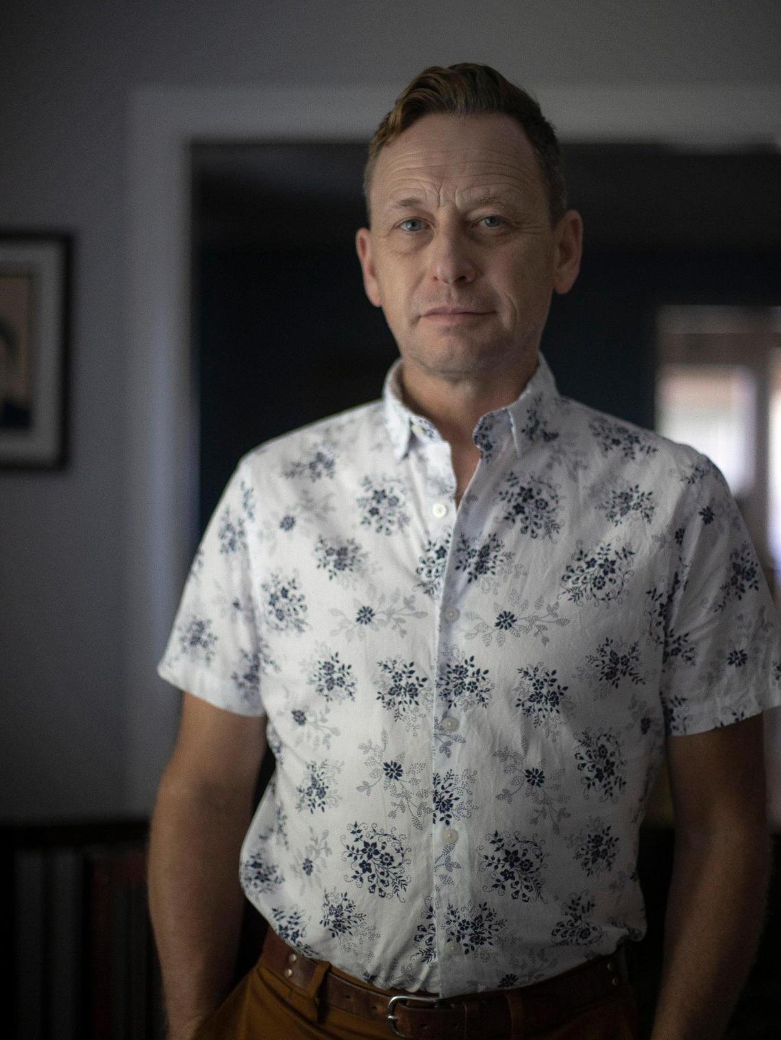 Silas House poses for portrait at his home in Lexington, Ky., on Wednesday, Sept. 21, 2022. House’s new novel, “Lark Ascending”, is set to be released Tuesday, Sept. 27.