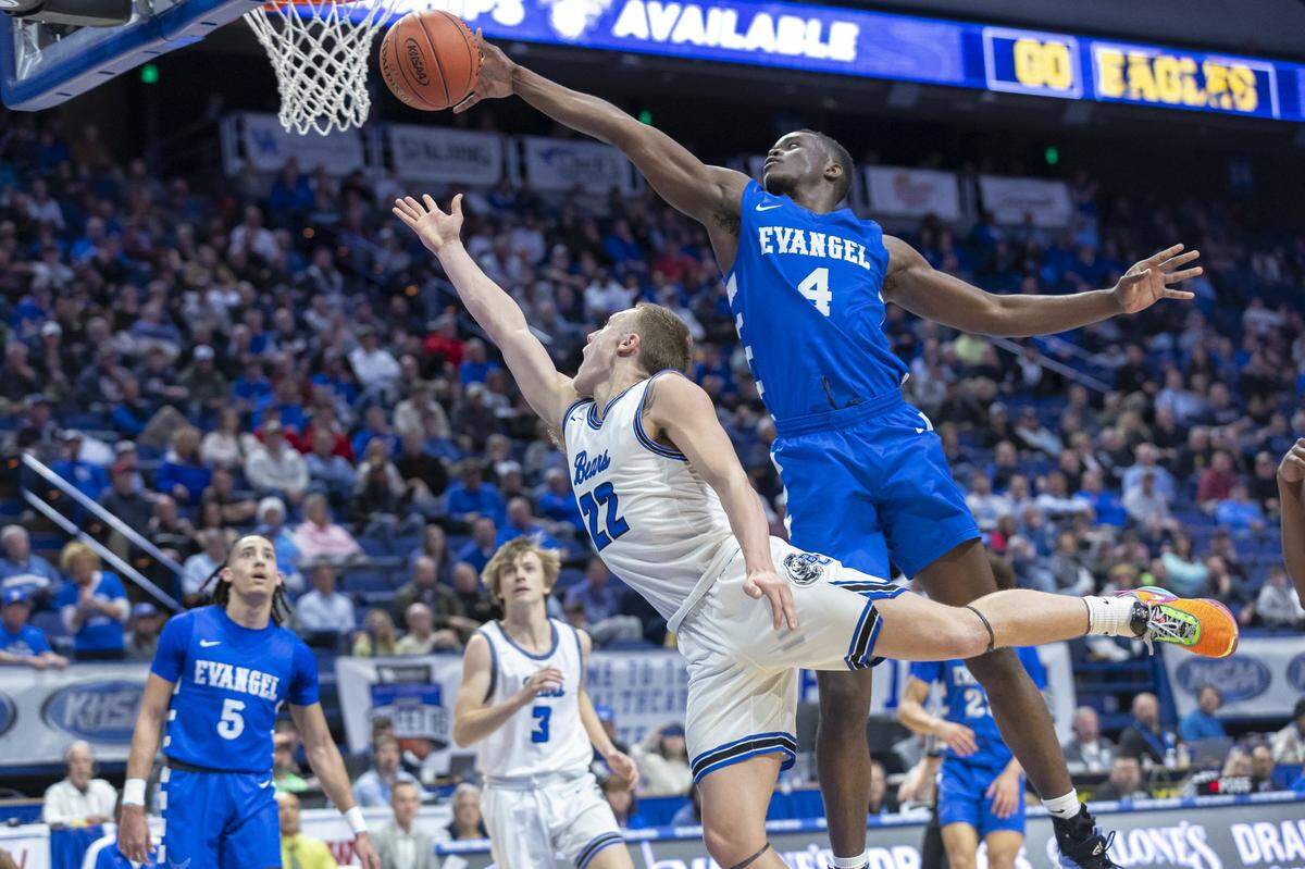 Evangel Christian’s Ben Mukadi (4) blocks a shot by Butler County’s Ty Price (22) during Thursday’s opening-round game in Rupp Arena. Mukadi finished with eight points, four rebounds and two blocks.