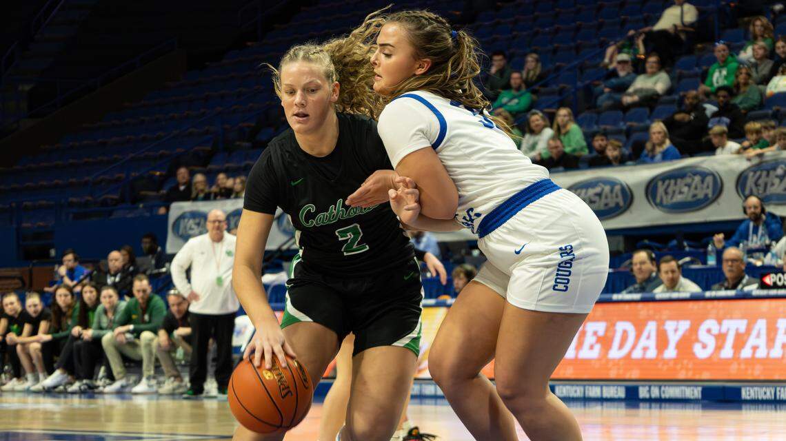 Owensboro Catholic's Katie Hagan drives the ball to the basket for two points during the 2026 Clark's Pump-N-Shop Girls' Basketball Sweet 16 state tournament first-round game between Owensboro Catholic and Letcher Central on March 12, 2026, at Rupp Arena in Lexington, Ky.