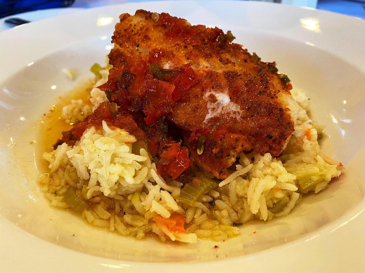 Old Bay baked cod with a champagne sauce and hot pepper jelly gastriique basmati rice pilaf, Feb. 8, 2022 at The Lemon Tree, the University of Kentucky student-run restaurant on the UK campus.