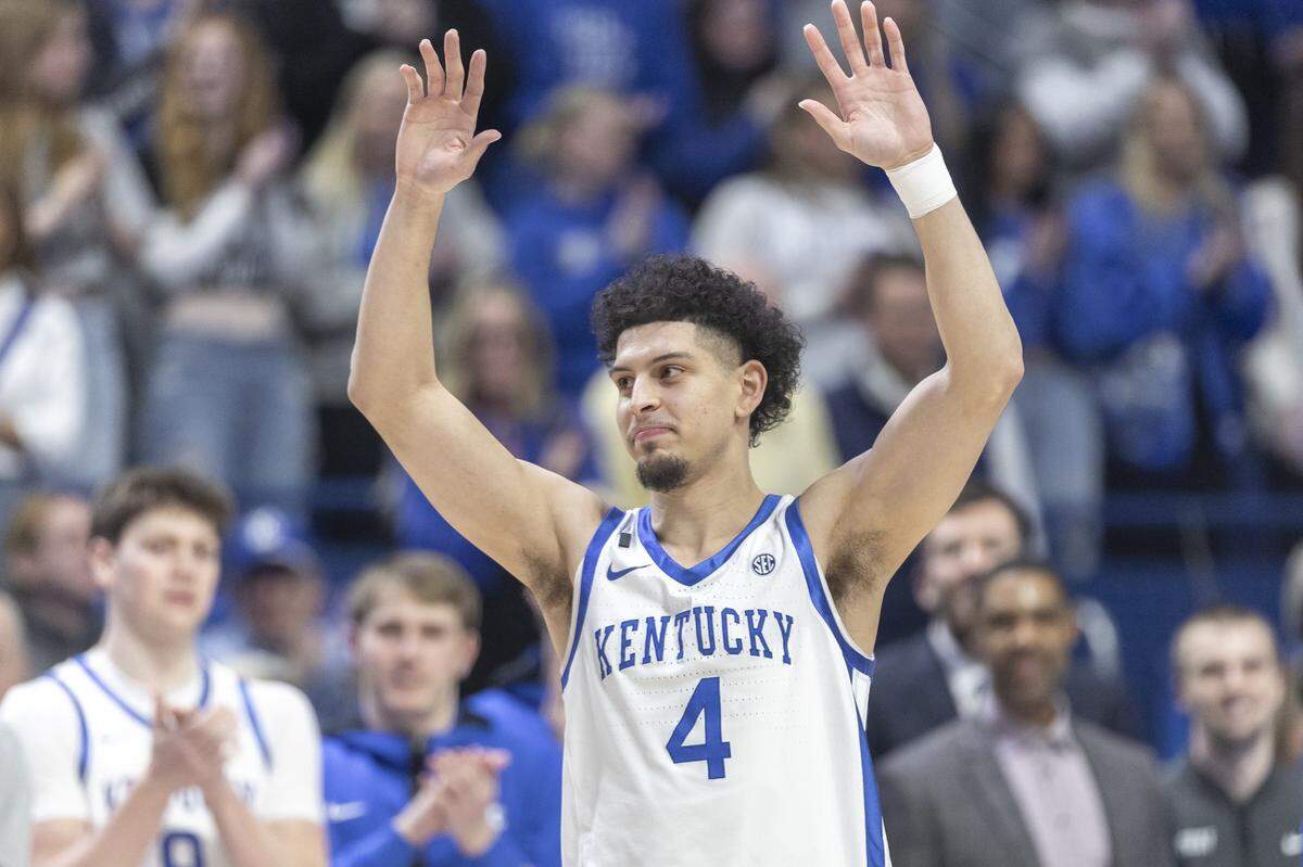 Kentucky guard Koby Brea (4) is introduced during Senior Night ceremonies before Tuesday’s game against LSU at Rupp Arena.