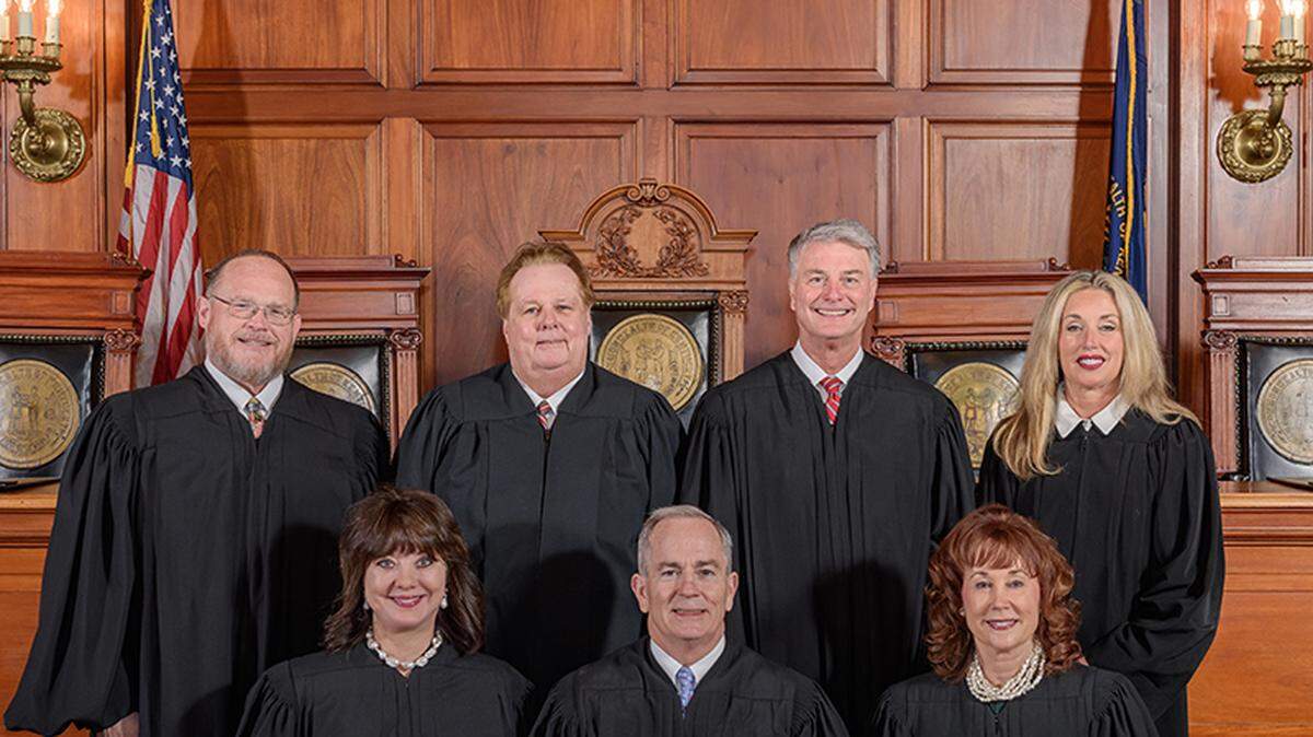 Kentucky Supreme Court Chief Justice Laurance B. VanMeter, front row center, and other justices shown in the courtroom in January 2023.