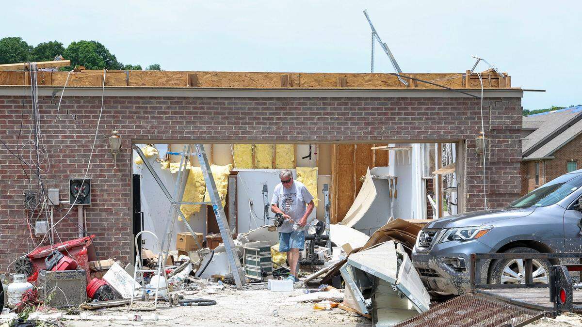 Lacy Castle salvaged what he could from his damaged home on Cedar Ridge Drive in the Crooked Creek neighborhood east of London, Ky., Sunday, May 18, 2025. Two days earlier, thunderstorms and a deadly tornado ripped through the Laurel County, destroying many homes, including Castle’s, who survived the storm in his house along with his wife. “I’m just out here getting what was kind of left,” Castle said. He and his wife are starting at a local hotel for now.