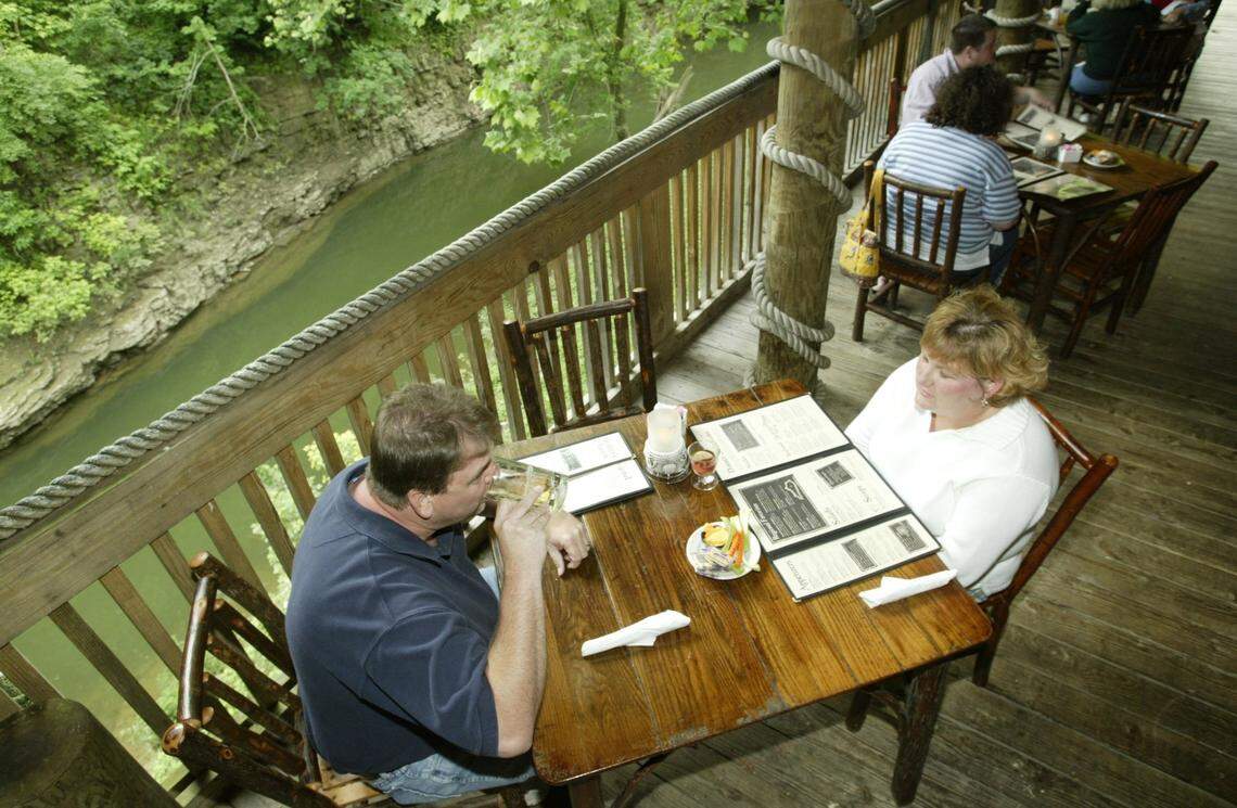 David and Jennifer Congleton enjoy Hall’s beer cheese May 30, 2003 on the restaurant’s patio in Winchester. The beer cheese was often a popular first course at the dining spot that serves Southern food near the Kentucky River.