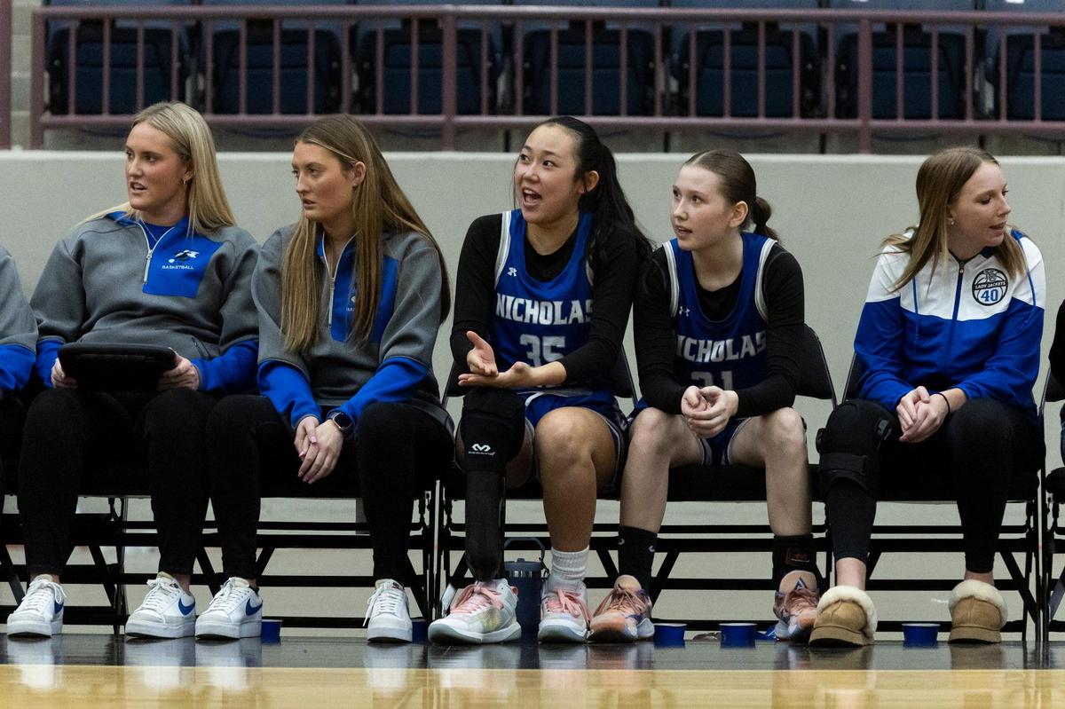 Katie Switzer (35) was born without a right foot but is able to compete in athletics thanks to her sport blade prosthetic.