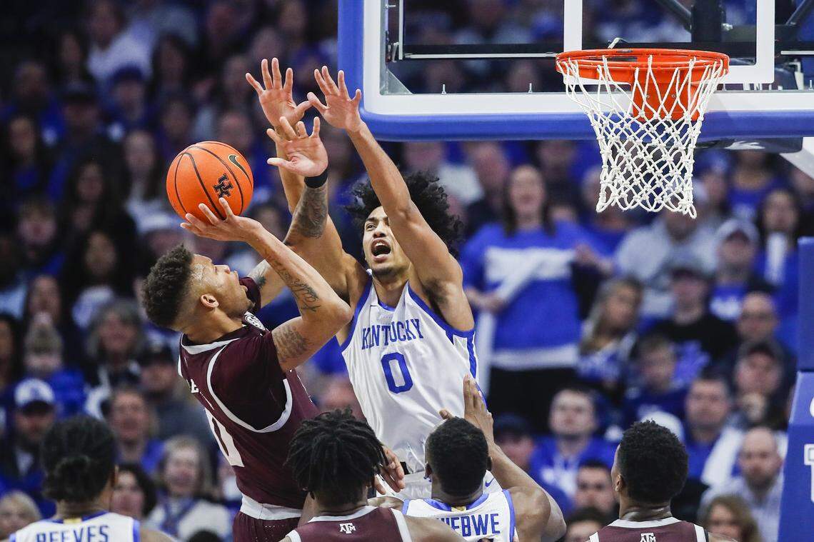 Kentucky’s Jacob Toppin (0) defends the basket against Texas A&M on Saturday. Toppin finished with 17 points, four rebounds, three assists and two steals.