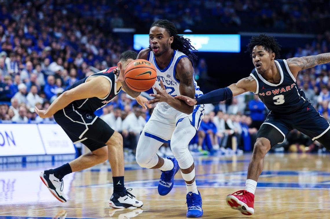 Kentucky Wildcats guard Cason Wallace (22) dribbles through Howard Bison guard Elijah Hawkins (3) during the game at Rupp Arena in Lexington, Ky., Monday, November 7, 2022.