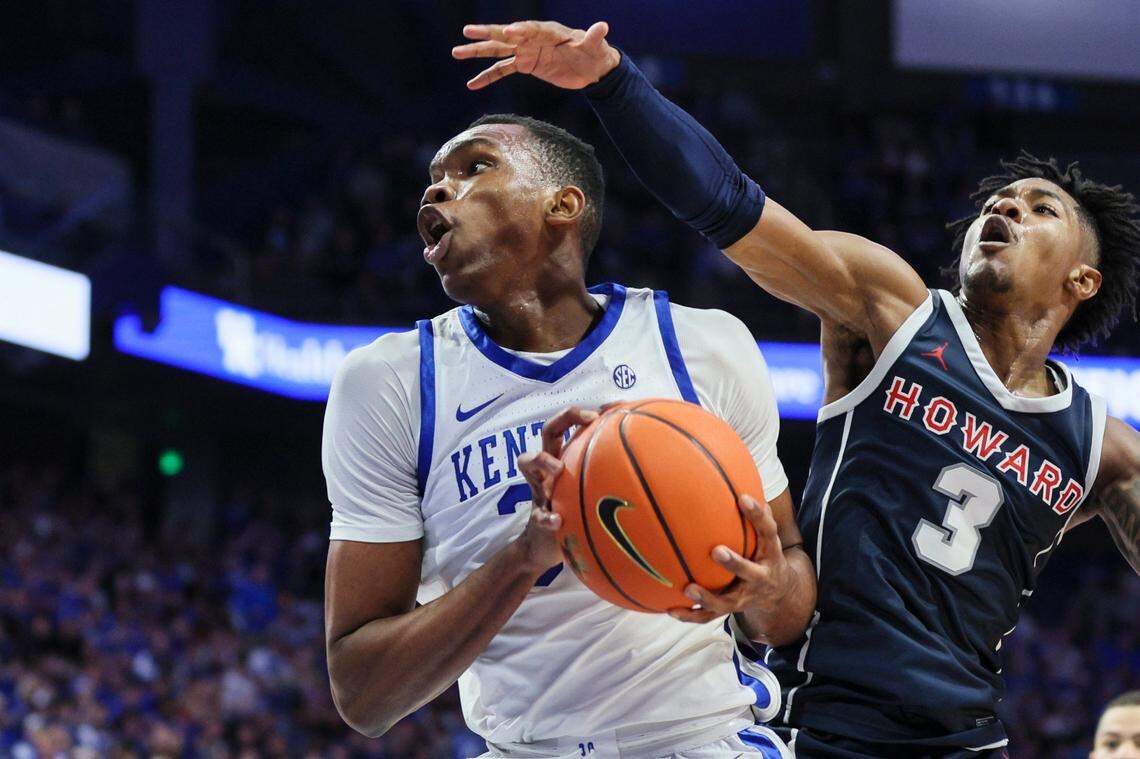 Kentucky Wildcats forward Ugonna Onyenso (33) takes a rebound against Howard Bison guard Elijah Hawkins (3) to score in the first half during the game at Rupp Arena in Lexington, Ky., Monday, November 7, 2022.