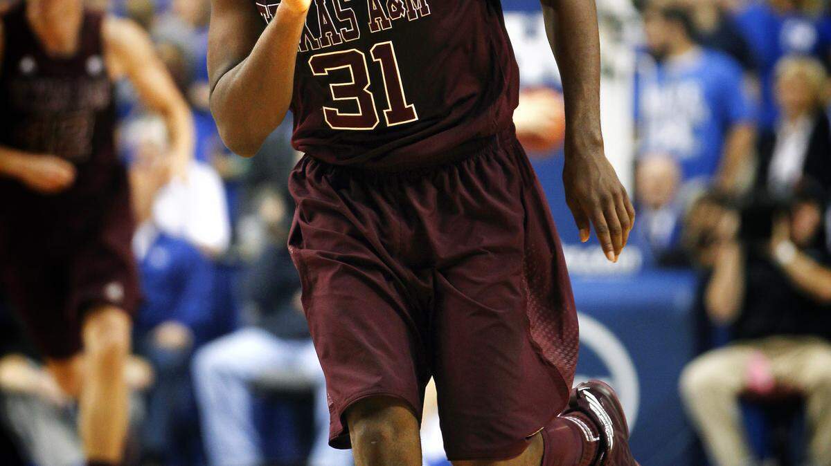 Texas A&M Aggies guard Elston Turner (31), shushed the crowd after a three pointer en route to a 40 point game as  as Texas A&M defeated Kentucky 83-71  on Saturday January 12, 2013 in Lexington, KY. Photo by Mark Cornelison | Staff 