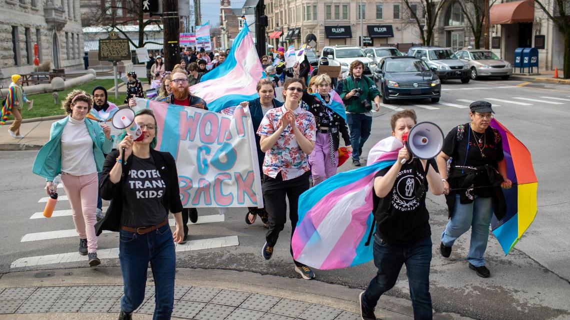 People gather for a rally organized by LGBTQ youth and adults in opposition to Senate Bill 150 and also to celebrate Trans Day of Visibility in Lexington, Ky., Friday, March 31, 2022.