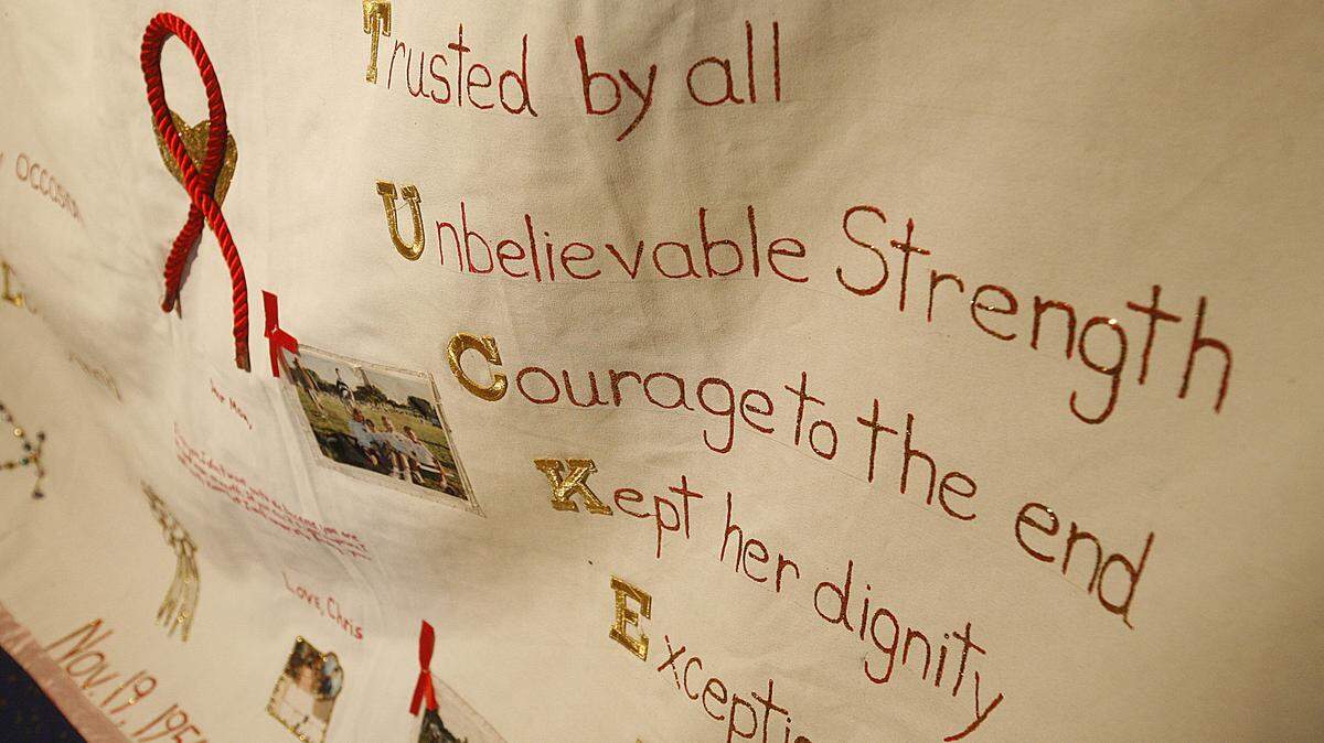The AIDS Memorial Quilt, which was begun in 1987, was on display at the Rasdall Gallery at the UK Student Center. Above is a detail from one of its panels. Each section of the quilt has been sewn by family and friends of someone who has died of AIDS.