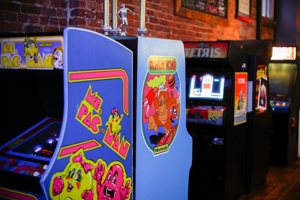 Arcade games including Ms. Pac Man, Donkey Kong, Tetris and Street Fighter at Arcadium. The bar currently offers nine games to play.