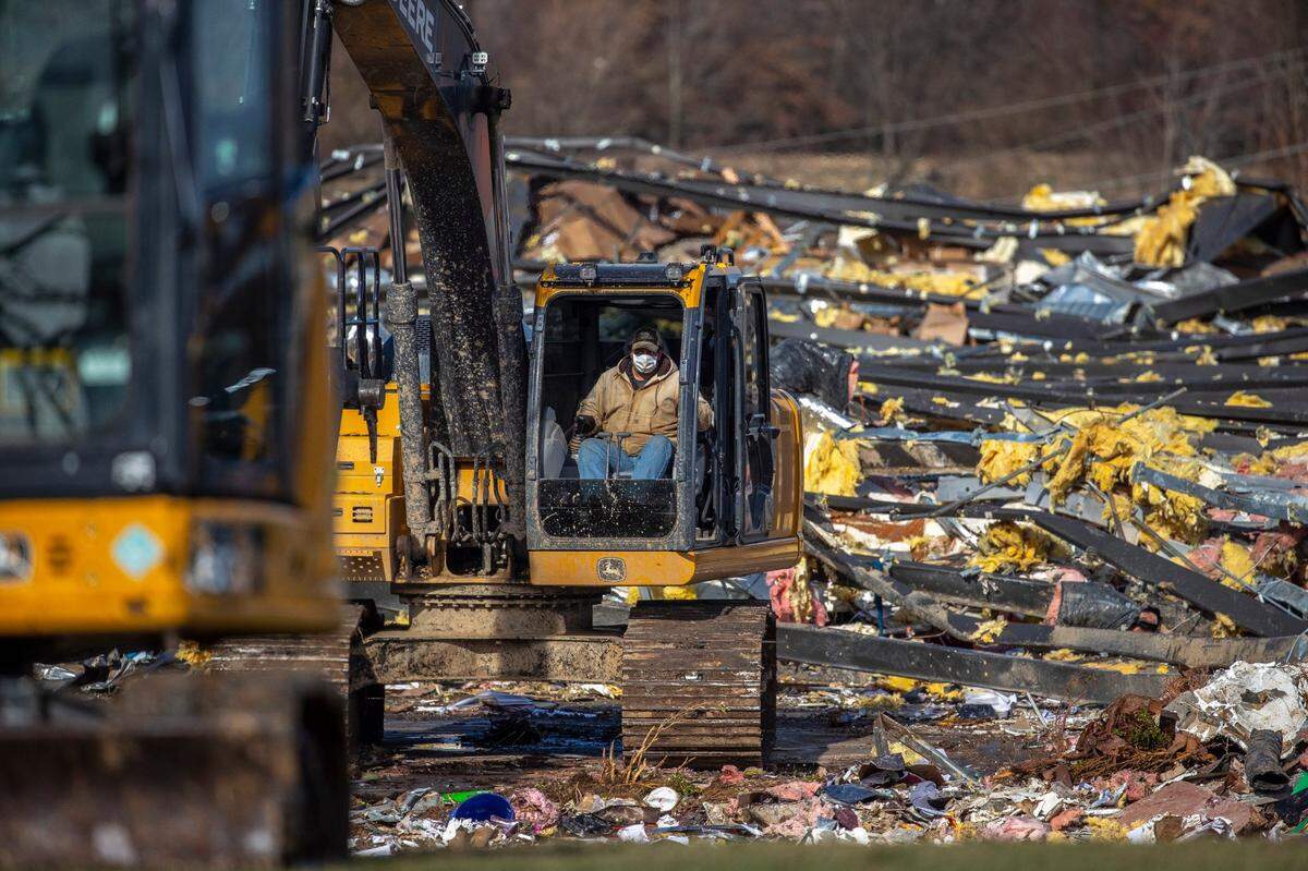 Search and rescue efforts were underway at Mayfield Consumer Products, a candle factory, Saturday, Dec. 11, 2021, after a tornado traveled through the region Friday night.