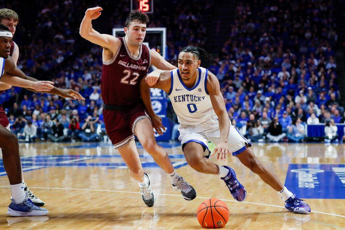 Kentucky’s Jacob Toppin, right, dribbles against Bellarmine’s Bash Wieland on Tuesday at Rupp Arena. Toppin finished with 12 points, five rebounds and two assists.