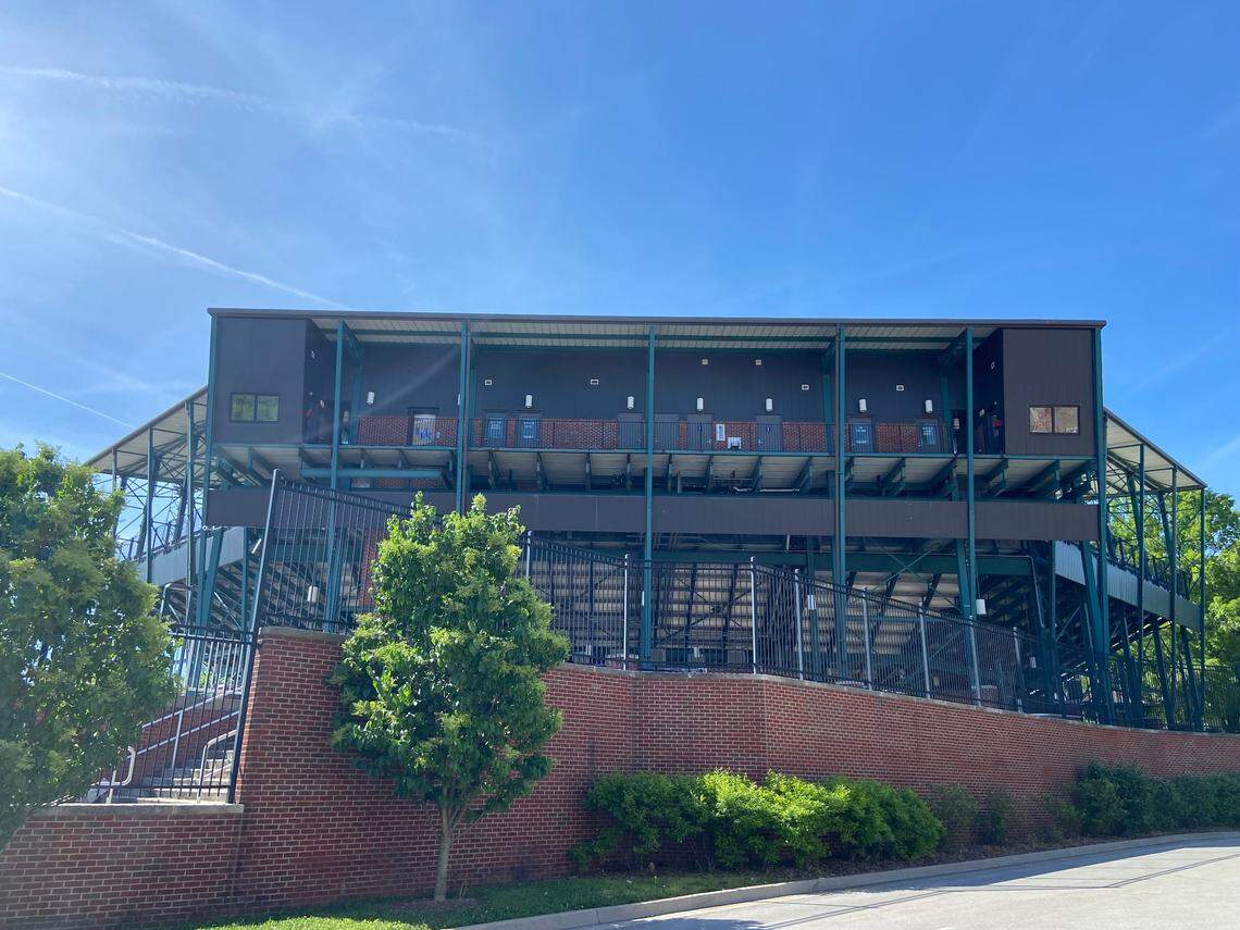 The exterior of Cliff Hagan Stadium, as seen from a neighboring parking lot. There are still signs on doors labeling the radio booths and press box areas at the venue, which hosted its final college baseball game in May 2018.