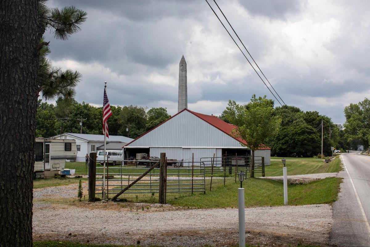 The 351-foot obelisk memorial for Jefferson Davis can been seen for a couple miles, over fields in Pembroke, Ky., Thursday, July 8, 2021.