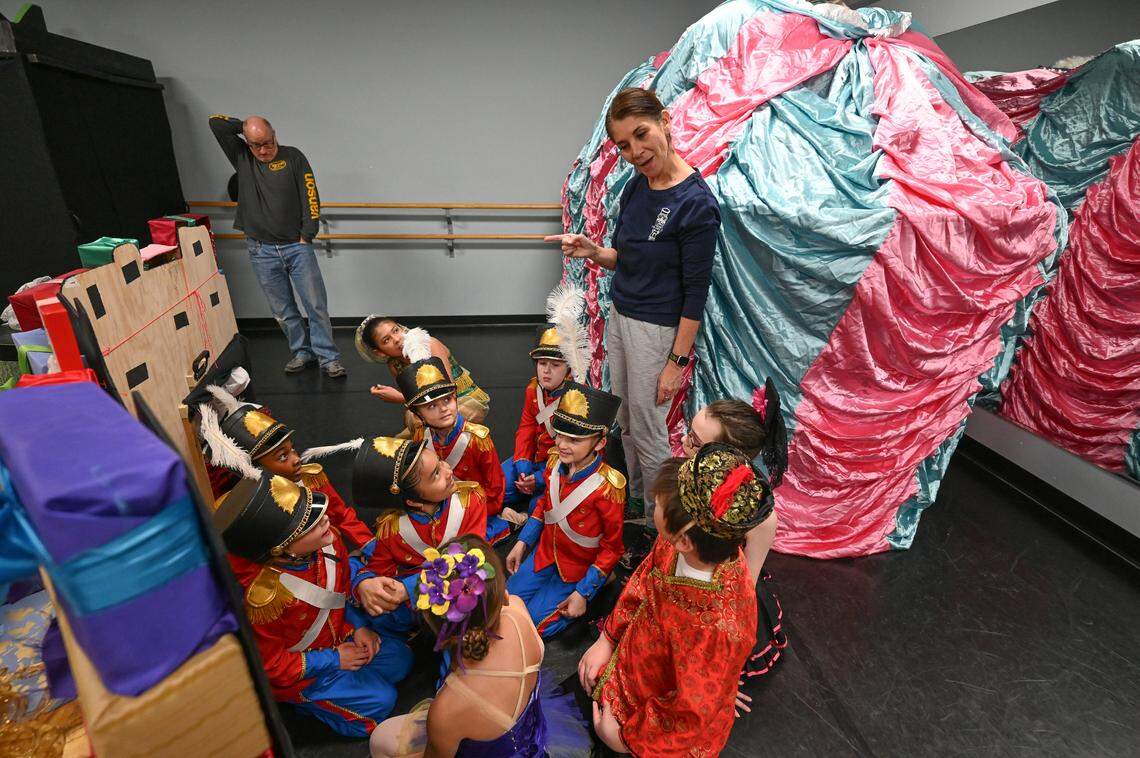 Bluegrass Youth Ballet founder and director Adalhi Aranda gives dancers playing soldiers instructions before rehearsal starts. Bluegrass Youth Ballet rehearsed for its 2024 edition of Nutcracker In One Act at its studios on Southland Drive in Lexington, Kentucky on Dec. 14, 2024.