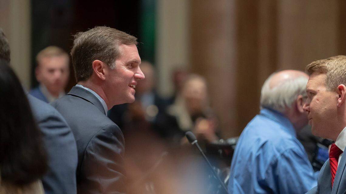 Kentucky Gov Andy Beshear greets state lawmakers before he delivers his State of the Commonwealth Address at the Kentucky state Capitol in Frankfort, Ky., on Wednesday, Jan. 4, 2023.