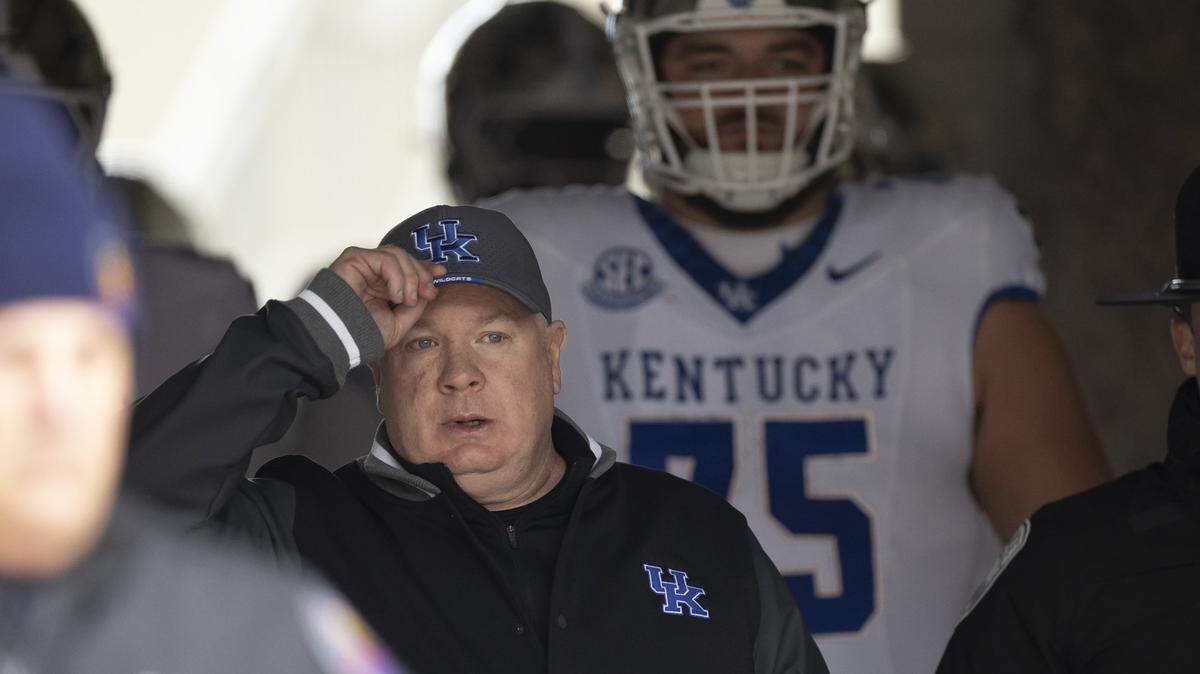 Kentucky Wildcats head coach Mark Stoops took the field before the Governor’s Cup at L&N Federal Credit Union Stadium in Louisville, Ky., on Saturday, Nov. 29, 2025. He was fired shortly after UK’s loss in the game.