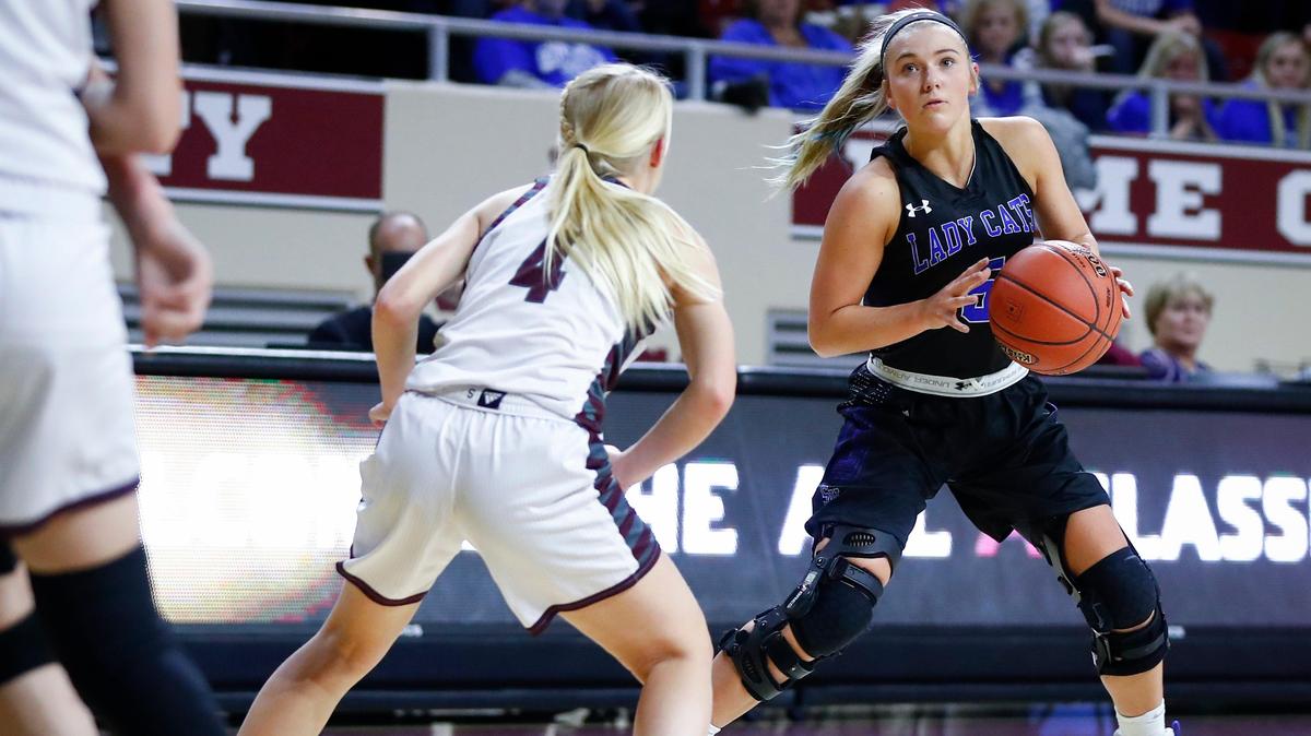 Shelby Valley’s Cassidy Rowe (5) dribbled past Holy Cross’ Sydney Brothers (4) during the All “A” Classic at Eastern Kentucky University’s McBrayer Arena in Richmond last year. The Kentucky commit returns to this year’s All “A,” which begins this week.
