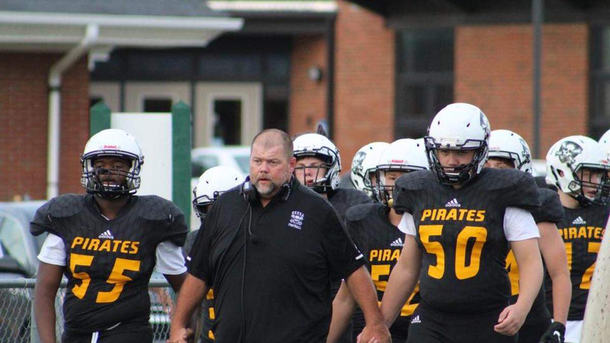 Berea Community High School snapped a 43-game losing streak, one of the longest in Kentucky, with an 18-0 win at Jellico (Tenn.) on Friday, October 26, 2018. Assistant coach Shawn Thacker (center) is pictured with sophomores JJ Walker (55) and Tanner Hayden (50).