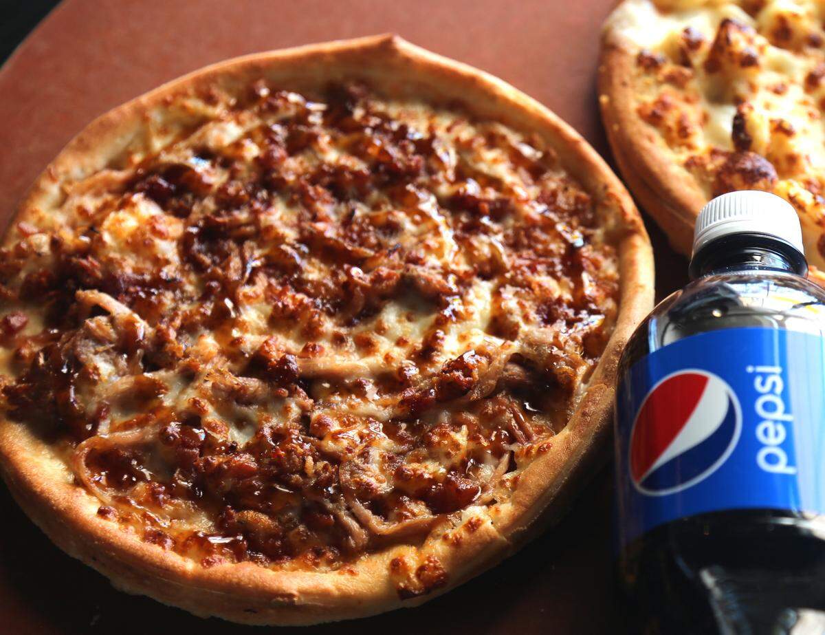 Big City Pizza is offering the Pig Newton with pulled pork on barbecue sauce at its Lexington location as well as in Nicholasville, Richmond and Danville.