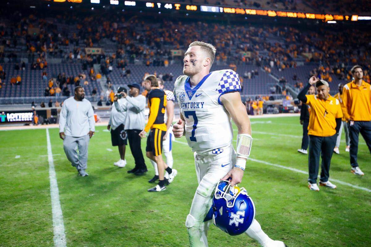 Kentucky quarterback Will Levis (7) runs off the field after a 44-6 loss at Tennessee on Saturday night. Levis threw three interceptions.