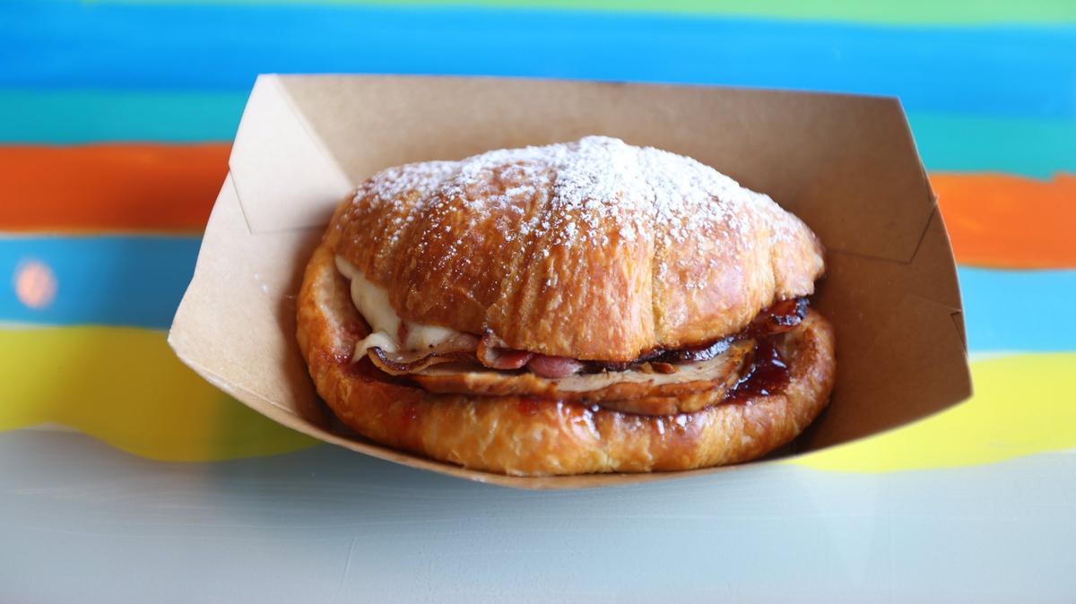 Ham, Apple Butter croissant sandwich served at the new DV8 Kitchen on the corner of East Third and Midland.