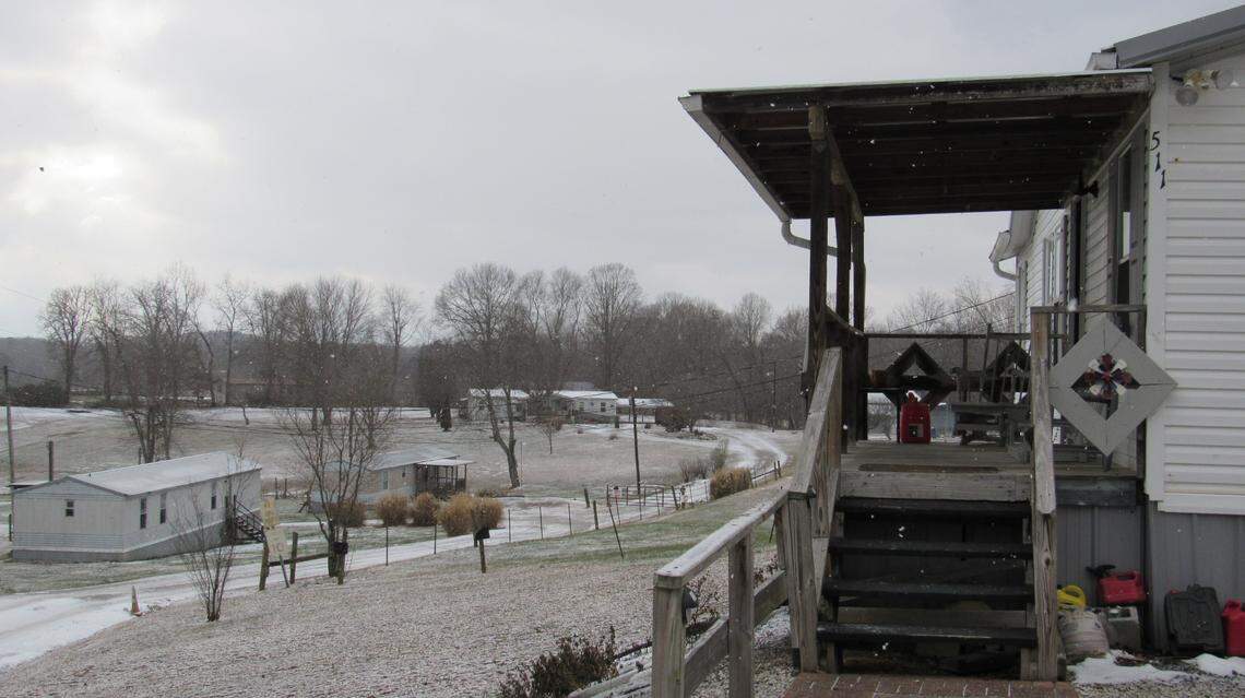 The doublewide mobile home at the right, numbered 511, is where London police fatally shot the occupant Dec. 23 while trying to serve a warrant. The singlewide mobile home down the hill, at the left of the photo, has numbers that matched the warrant, not the house at right, but pubic records identify the house at right with a different address than 511, which matches the warrant,