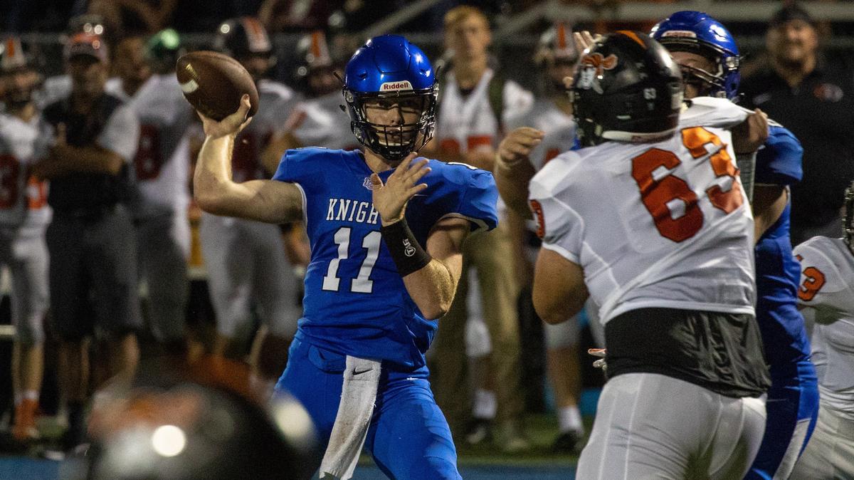 Lexington Catholic’s Beau Allen (11) dropped back to pass as Lexington Catholic hosted Ryle on  Friday Aug. 24, 2018 in Lexington, Ky.